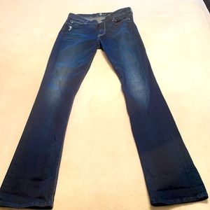 Size 29- Skinny bootcut jeans in dark blue.